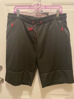 Black Athletic Drawstring Shorts with Red Accents by Reset.